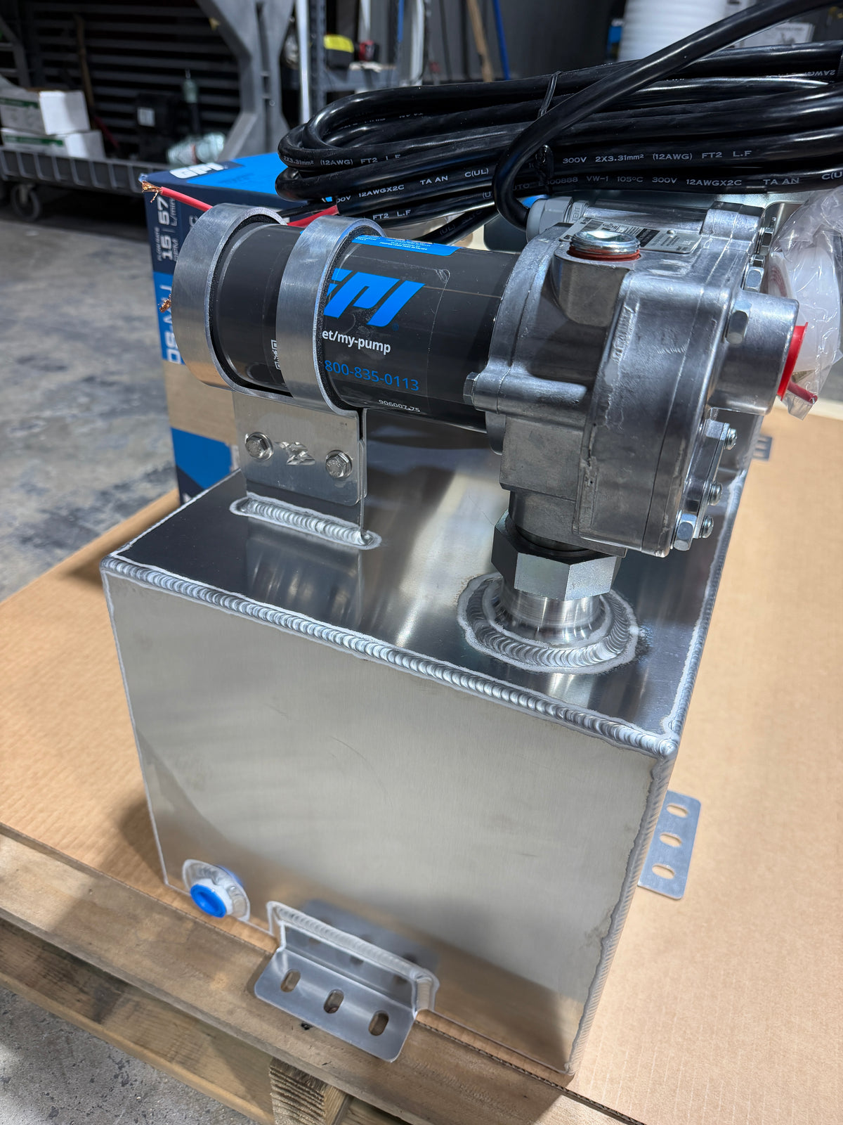 GPI 12V transfer pump mounted on a Boyd aluminum tank pump pocket